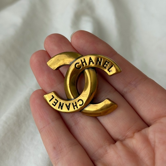 CHANEL Jewelry - CHANEL Gold-Tone Embossed CC Logo Brooch